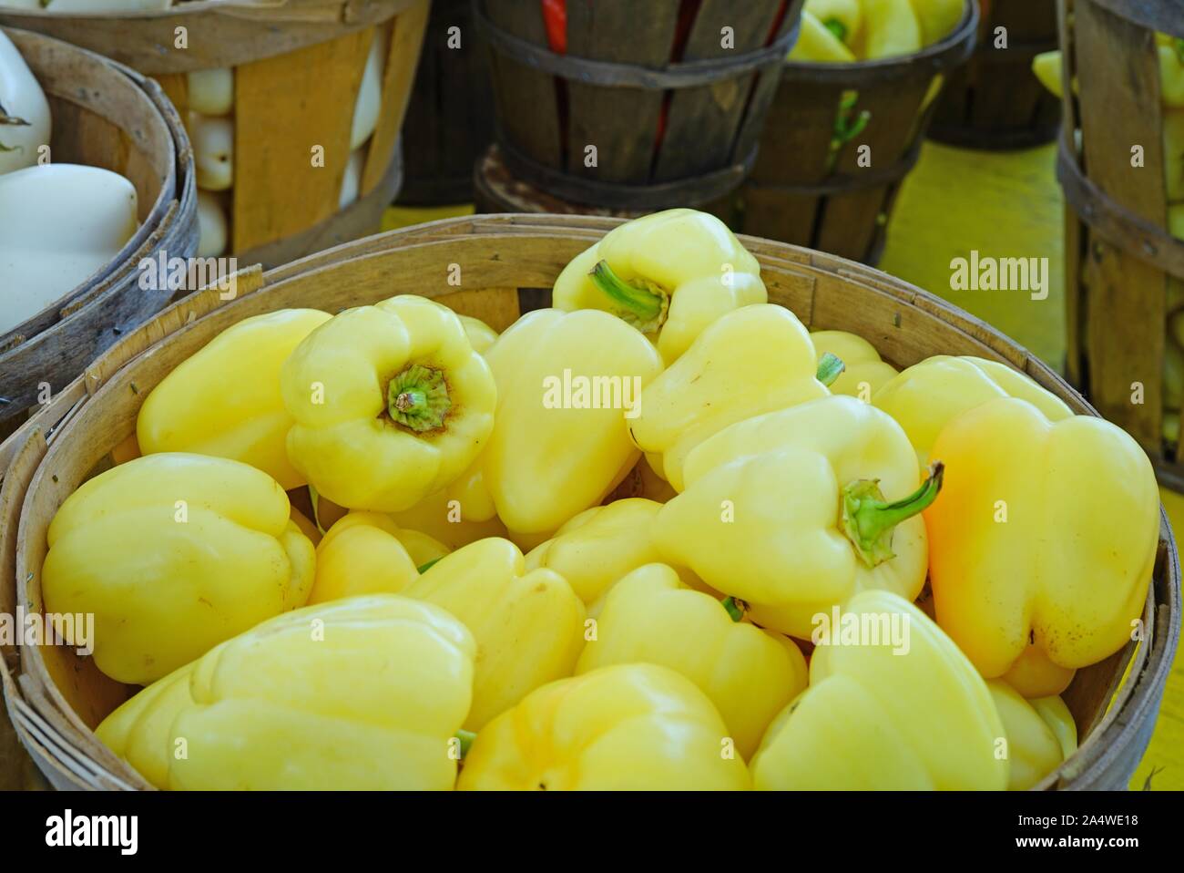 Baskets of colorful peppers at a summer farmers market Stock Photo - Alamy
