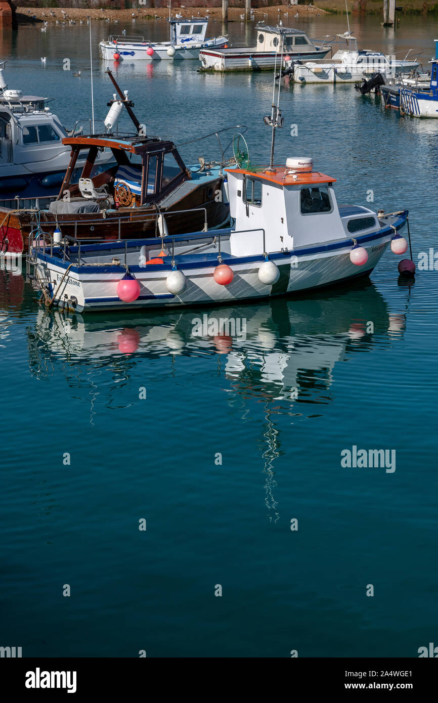 Folkestone harbour. With fishing boats, yachts, little boats and speed