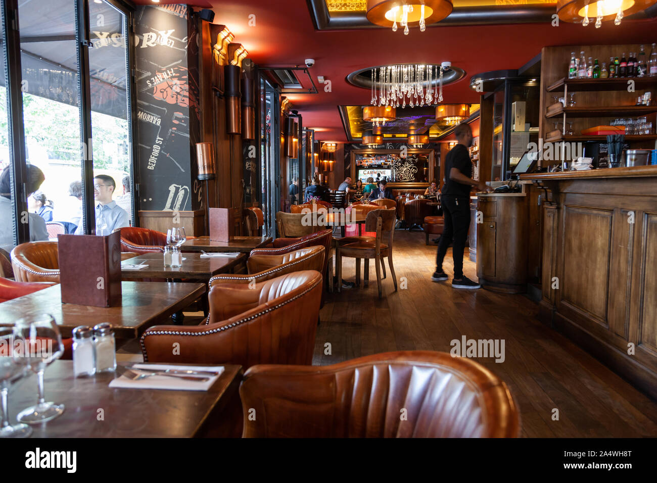 The Cafe Culture has been in existence in Paris since the 17th century. Stock Photo
