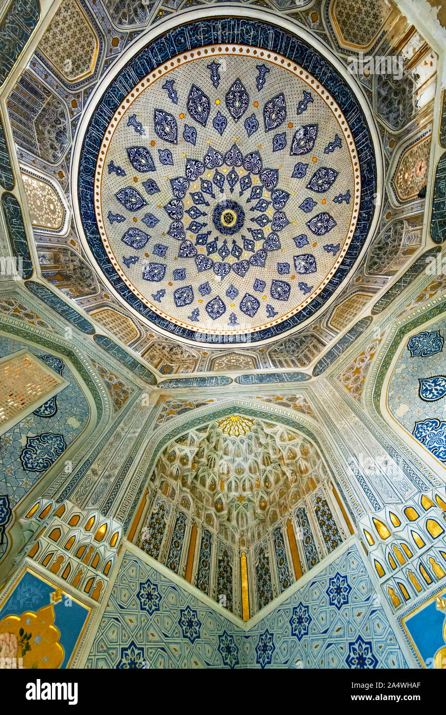 Shirin Beka Oka Mausoleum, built by Timur for his sister at the end of 14th century. The Shah-i-Zinda Ensemble includes mausoleums and other ritual bu Stock Photo