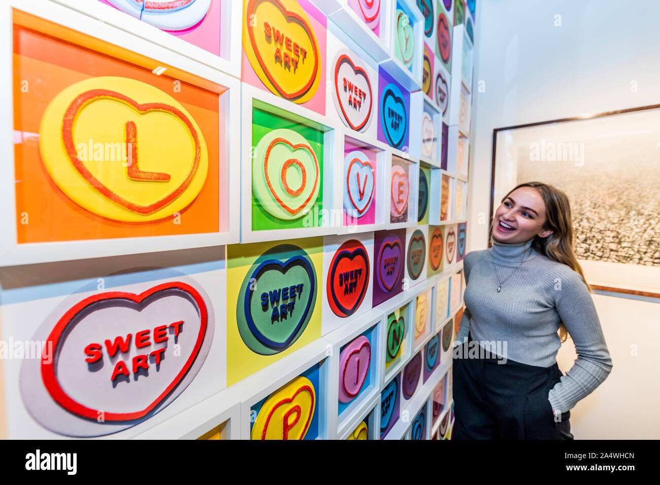 Battersea, London, UK. 16th Oct 2019. Love Hearts by Dean Zeus on TAG Fine Arts - The Affordable Art Fair opens in Battersea and runs until 20 Oct. The fair offers visitors a chance to purchase work from over 100 galleries at prices between £100 and £6,000 Credit: Guy Bell/Alamy Live News Stock Photo