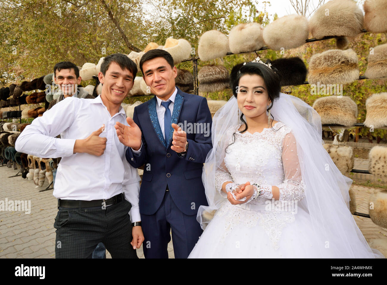 A wedding in the main street of the old town of Khiva, a very popular site for all the festivities in the town. Uzbekistan Stock Photo