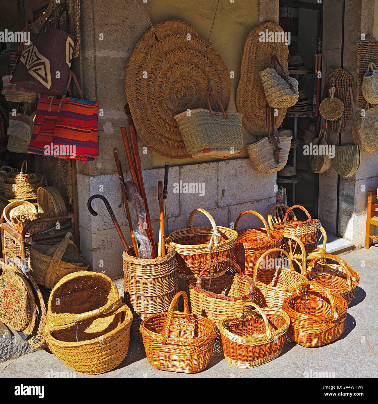Pavement display of Spanish wicker baskets in Gata de in the