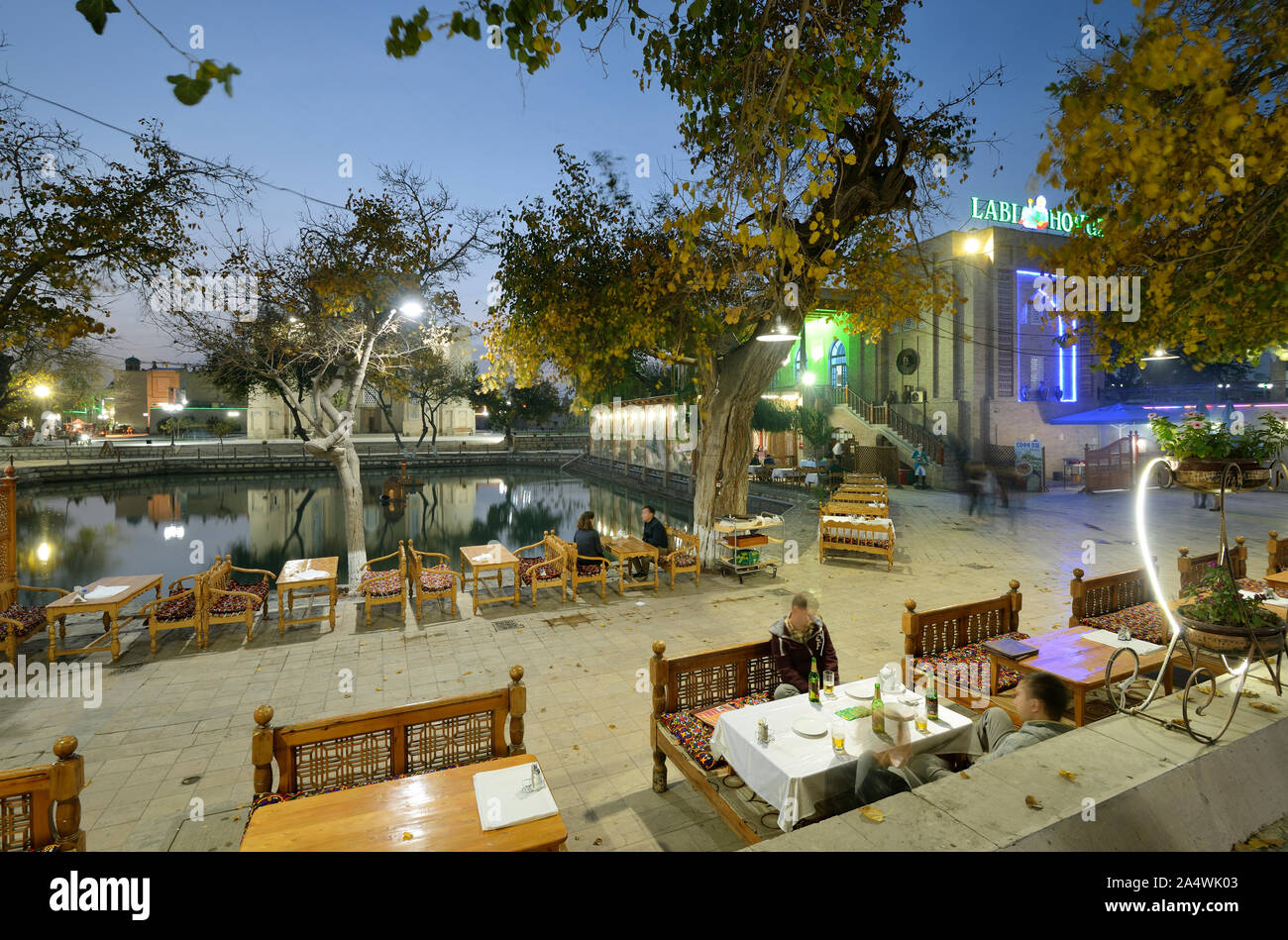 Lyabi Hauz, a wonderful and relaxing plaza, the heart of city life in Bukhara. A UNESCO World Heritage Site. Uzbekistan Stock Photo