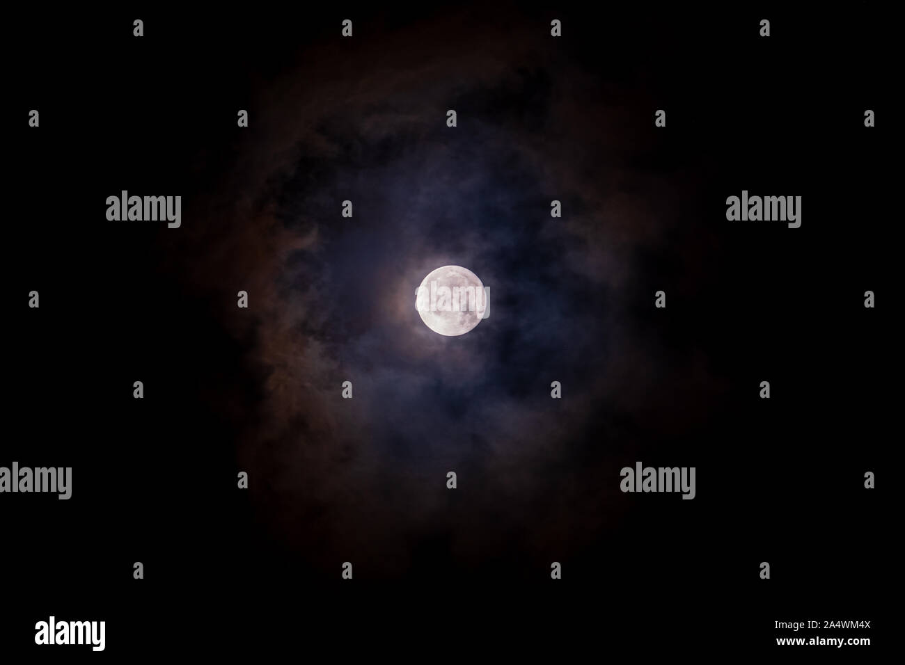 Full moon black background with clouds detail surface copy space Stock Photo