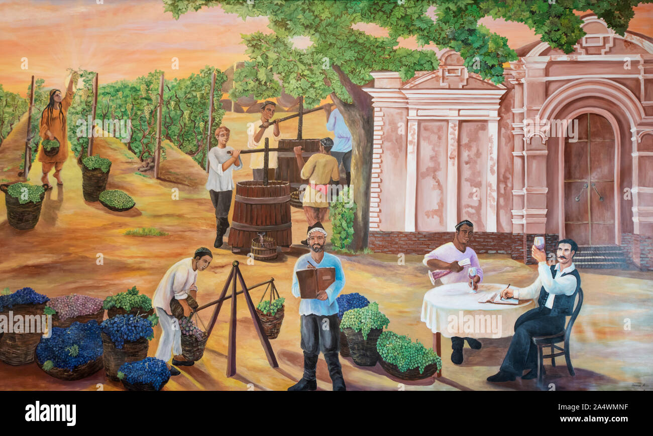 Paintings depicting the harvest of the vineyards. Wine tasting room at the Hovrenko Wine Factory. Samarkand, a Unesco World Heritage Site. Uzbekistan Stock Photo