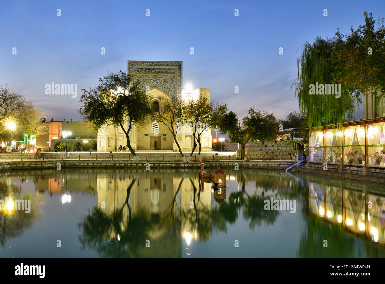 Lyabi Hauz, a wonderful and relaxing plaza, the heart of city life in Bukhara. A UNESCO World Heritage Site. Uzbekistan Stock Photo