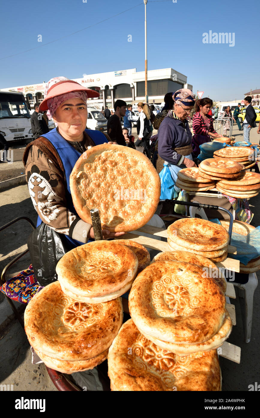 Uzbek bread in the food market. Bukhara, a UNESCO World Heritage Site.  Uzbekistan Stock Photo - Alamy, image size:867x1390