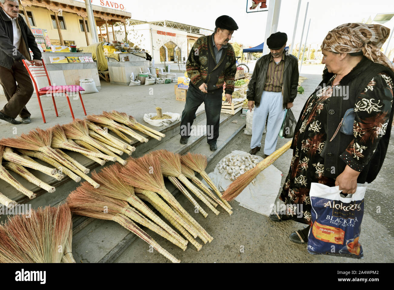 Traditional brooms for sale in the bazaar. Bukhara, a UNESCO World Heritage Site. Uzbekistan Stock Photo
