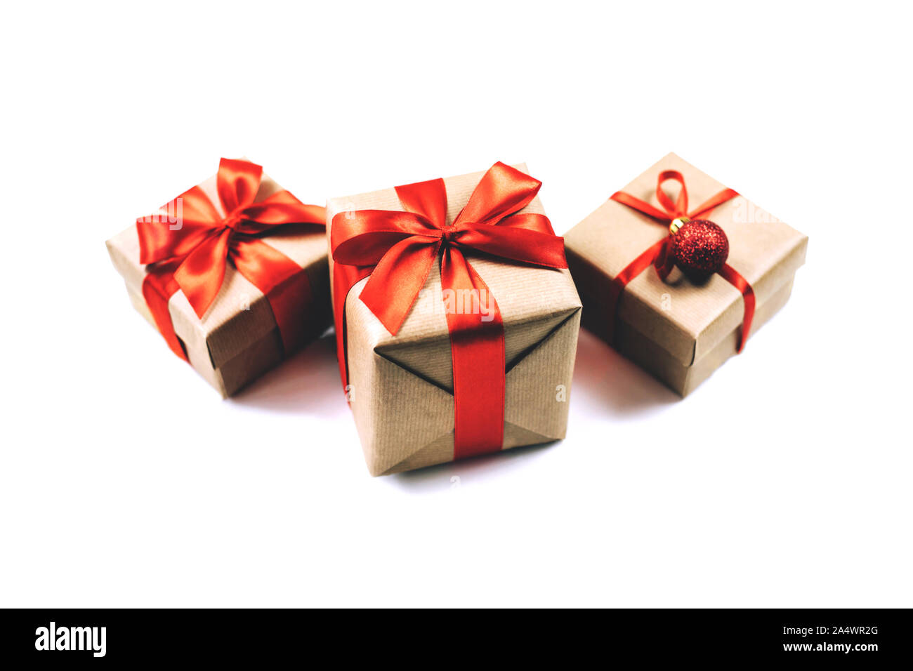 Festive gift boxes with red ribbon bow isolated on white background ...
