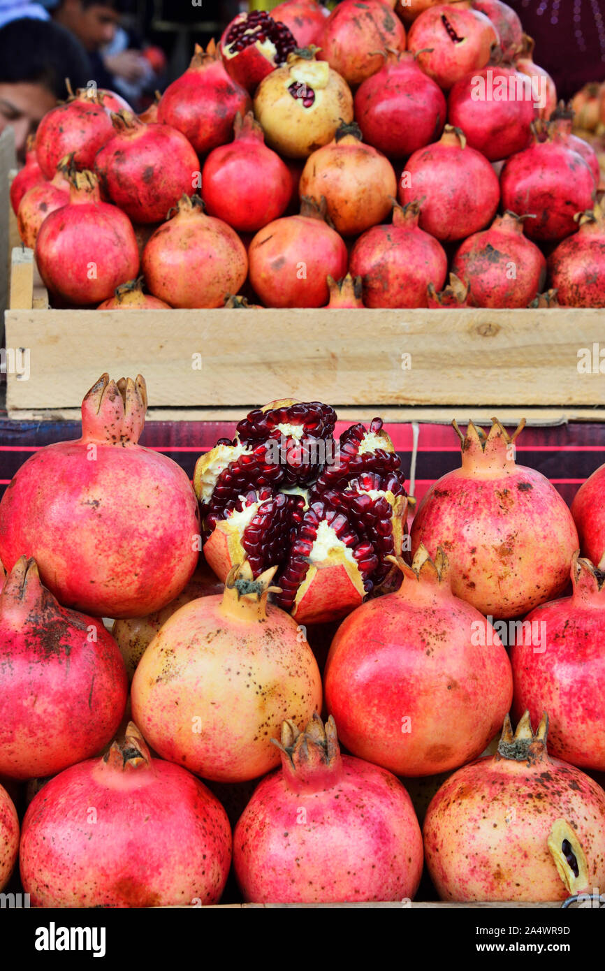 A suggestive display of pomegranates at the Siyob Bazaar. Samarkand, a UNESCO World Heritage Site. Uzbekistan Stock Photo