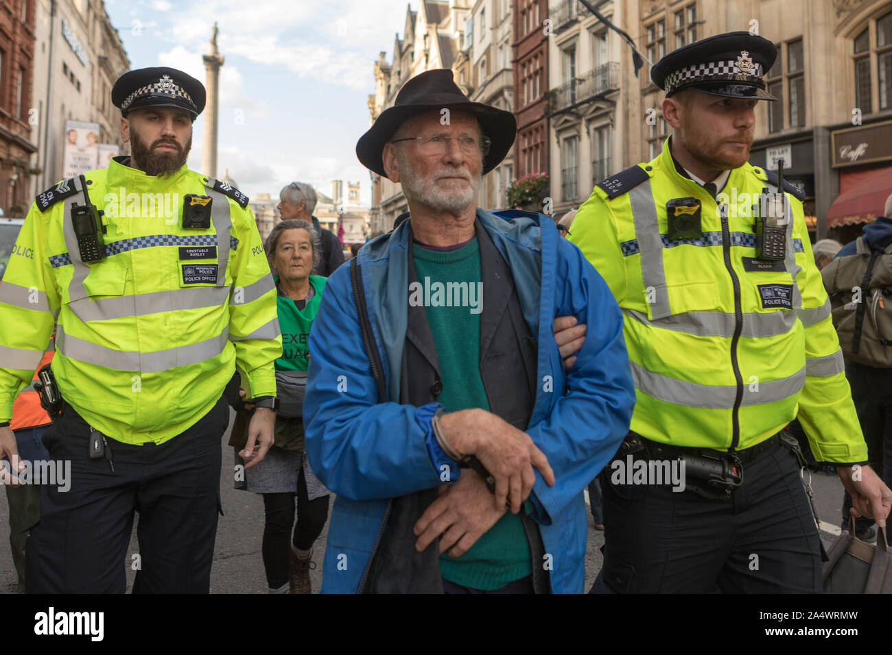 Whitehall, Westminster, UK. 16th Oct, 2019. Extinction Rebellion protesters block Whitehall, near Trafalgar Square. The protest follows the Metropolitan Police new restrictions using Section 14 of the Public Order Act, which requires protesters linked to extinction rebellion to disperse by 21:00 BST or risk arrest. Penelope Barritt/Alamy Live News Stock Photo