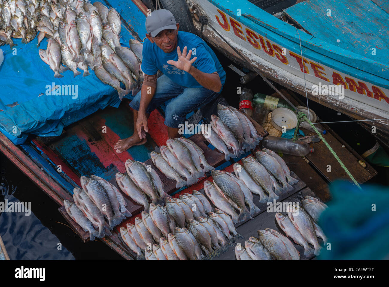 The fishing habor in Porto Flutante or Floating Habour, open fishing boats with owners selling fresh fish, Manaus, The Amazon, Brazil, Latin America Stock Photo