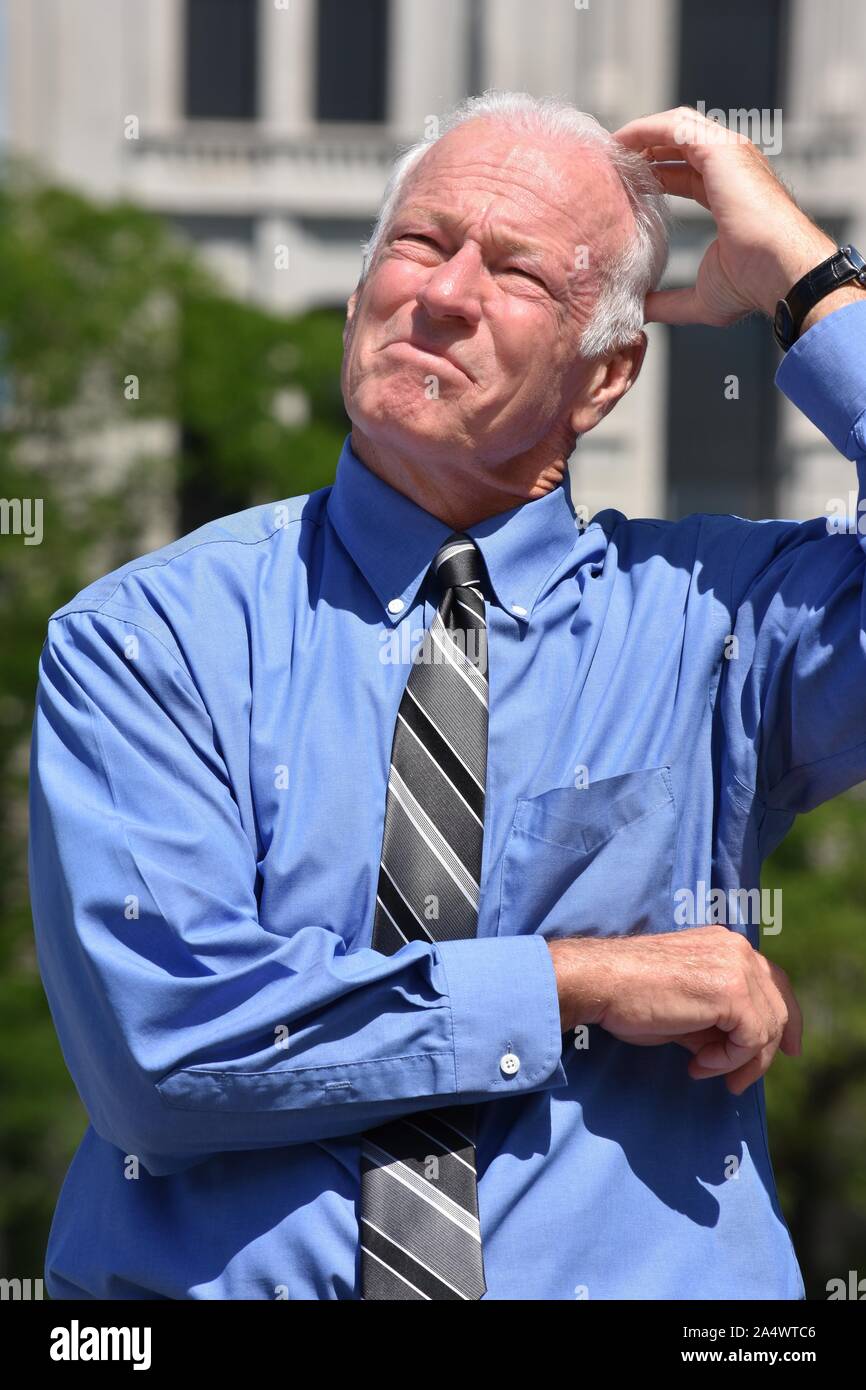 An Entrepreneur And Confusion Wearing Tie Stock Photo Alamy