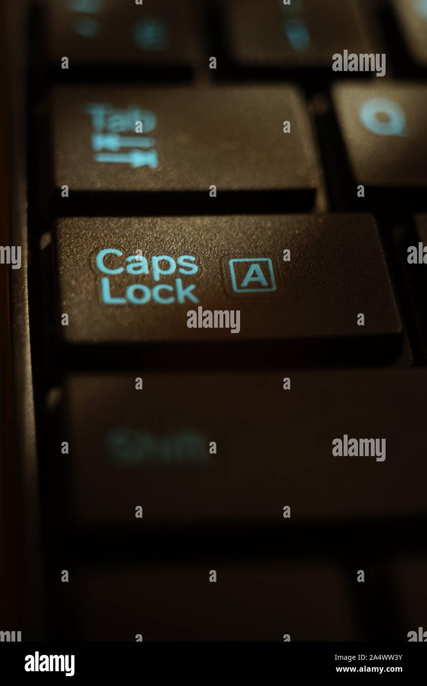 Black keyboard closeup. Focus on Caps Lock Stock Photo Alamy