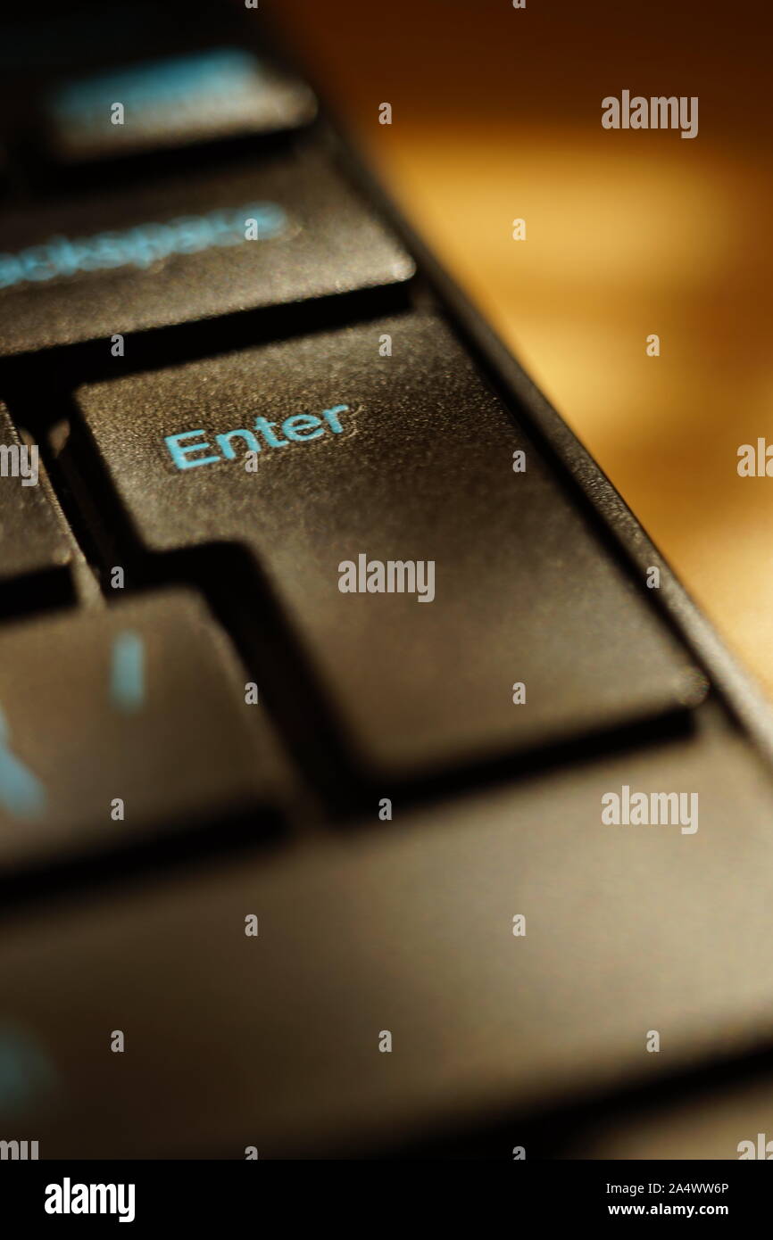 Black keyboard on the table closeup. Focus on key Enter Stock Photo
