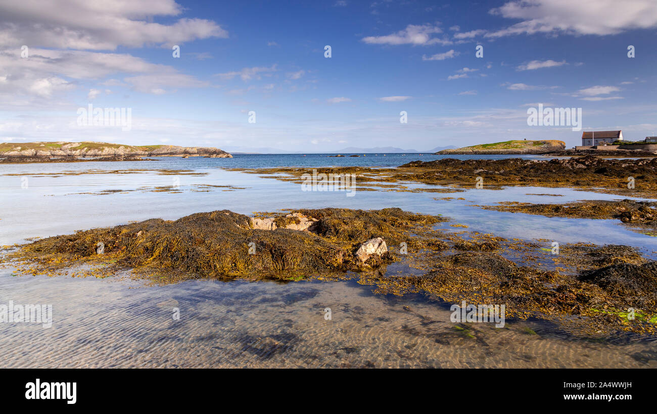 Rhoscolyn beach at low tide, Anglesey, North Wales on a sunny day Stock Photo