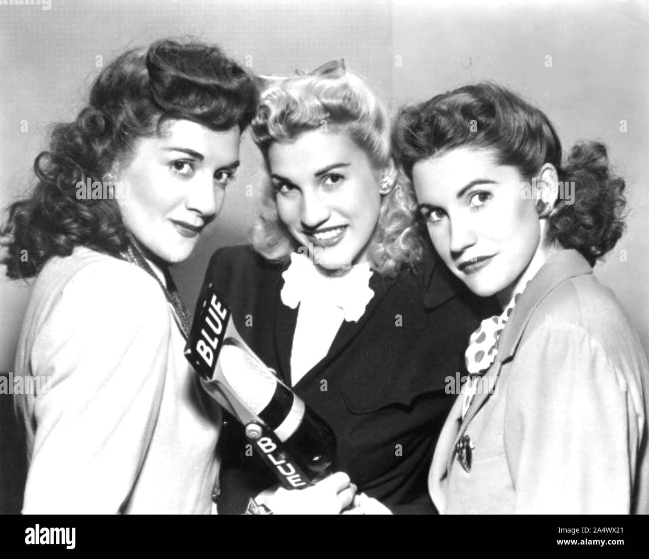 THE ANDREWS SISTERS American close harmony group about 1945. From left: LaVerne,Patty, Maxene. Stock Photo