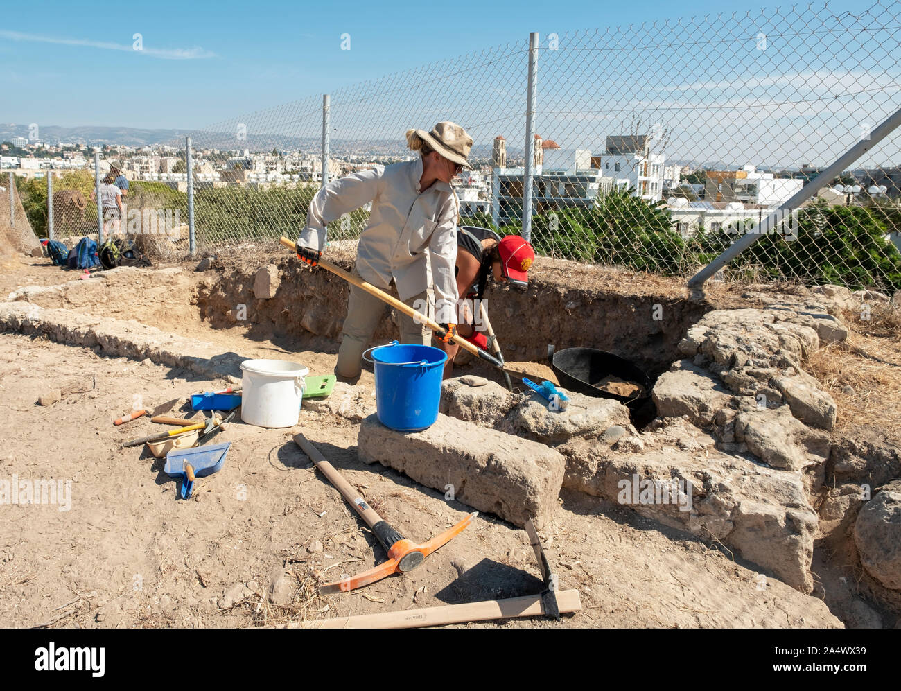 Archaeologists working on a site around the Catacombs in Neo Paphos which is a Unesco protected site of special interest in paphos town, Cyprus. Stock Photo