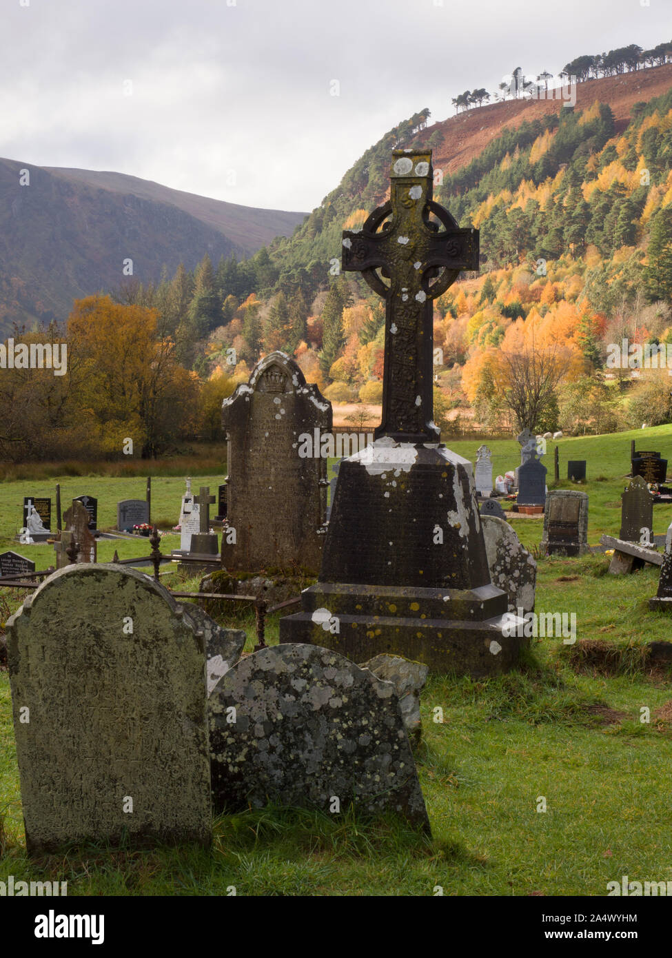 Tomb stones in cemetery, Glendalough, Wicklow Mountains National Park, County Wicklow, Ireland Stock Photo