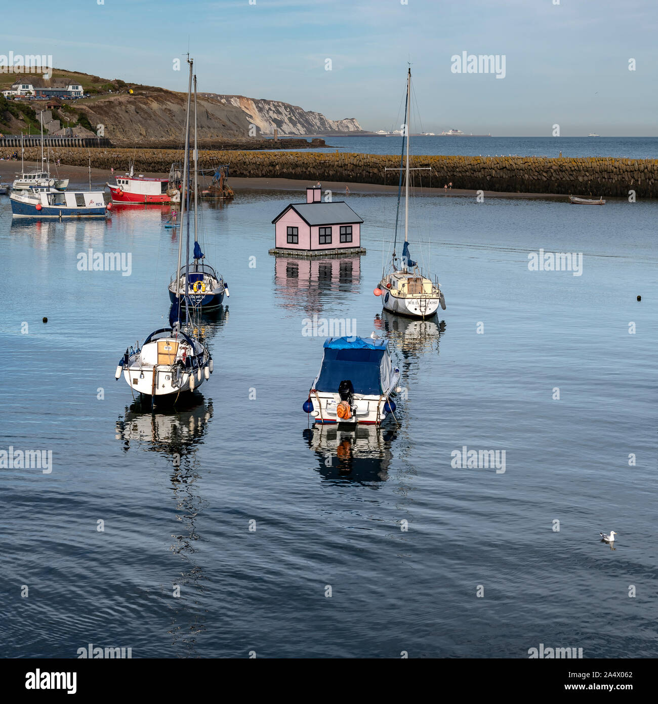 Folkestone harbour. With little boats and speed boats. The floating