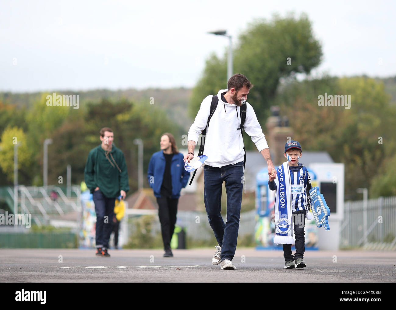 Fans arrive at the stadium for the English Premier League soccer match between Brighton & Hove Albion and Tottenham Hotspur at the Amex Stadium in Brighton, Britain 5 October 2019  EDITORIAL USE ONLY. No use with unauthorized audio, video, data, fixture lists, club/league logos or 'live' services. Online in-match use limited to 120 images, no video emulation. No use in betting, games or single club/league/player publications. Stock Photo