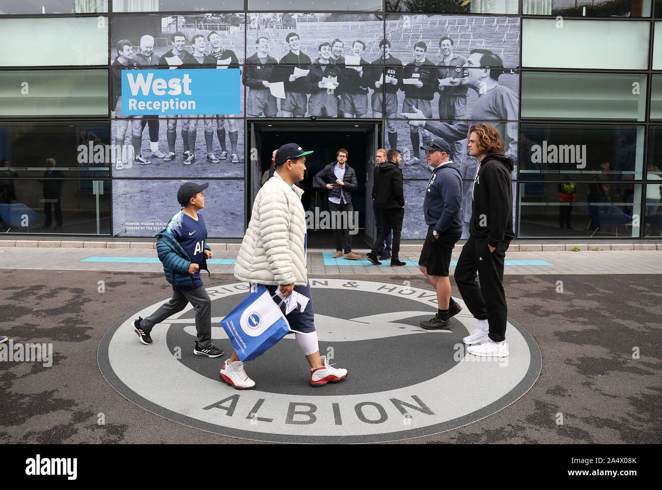 Fans arrive at the stadium for the English Premier League soccer match between Brighton & Hove Albion and Tottenham Hotspur at the Amex Stadium in Brighton, Britain 5 October 2019  EDITORIAL USE ONLY. No use with unauthorized audio, video, data, fixture lists, club/league logos or 'live' services. Online in-match use limited to 120 images, no video emulation. No use in betting, games or single club/league/player publications. Stock Photo