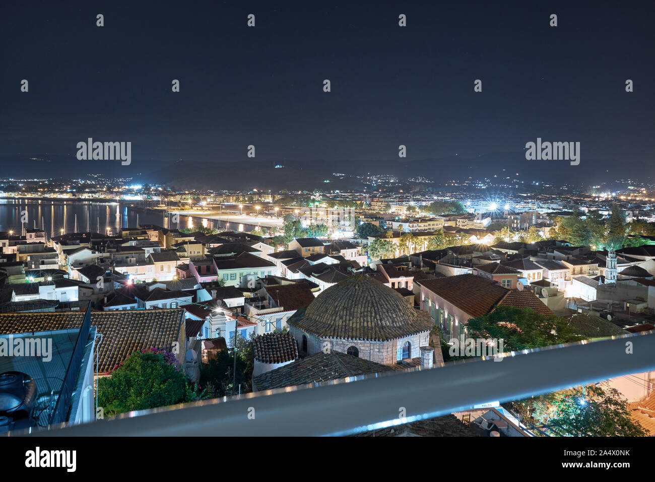 View over the city of Nafplio, Greece by night Stock Photo