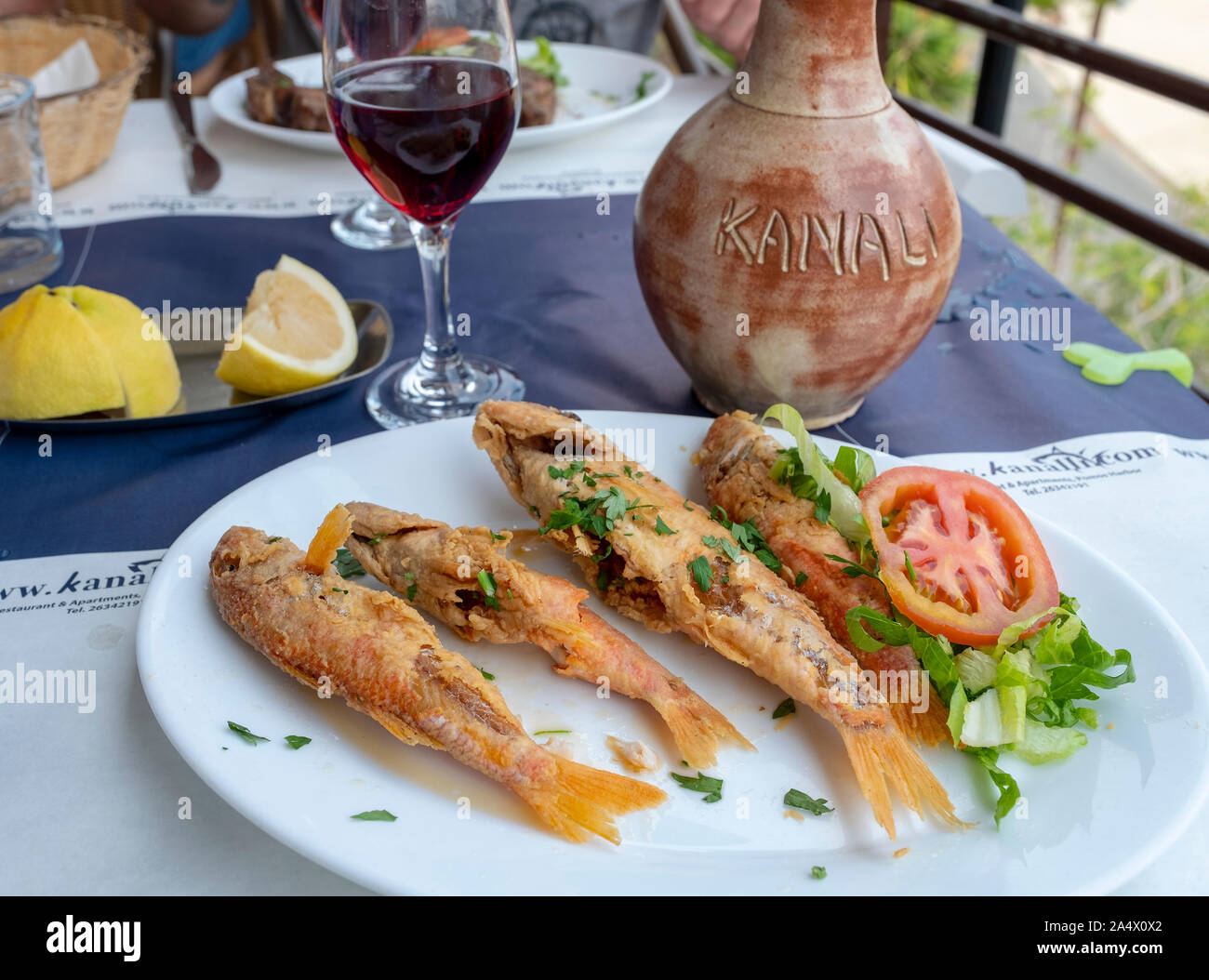 Grilled Red Mullet on a plate at the Kanalli Seafood Tavern, Pomos, Cyprus. Stock Photo