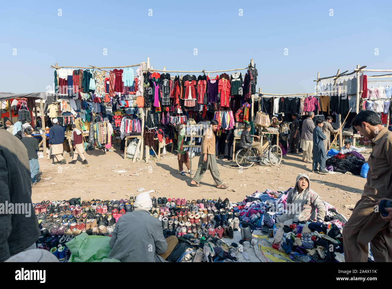 PESHAWAR, PAKISTAN- DECEMBER 13, 2015: Clothes and shoes for sale in sunday market(itwar Bazaar) Hayatabad, Peshawar Pakistan. Stock Photo