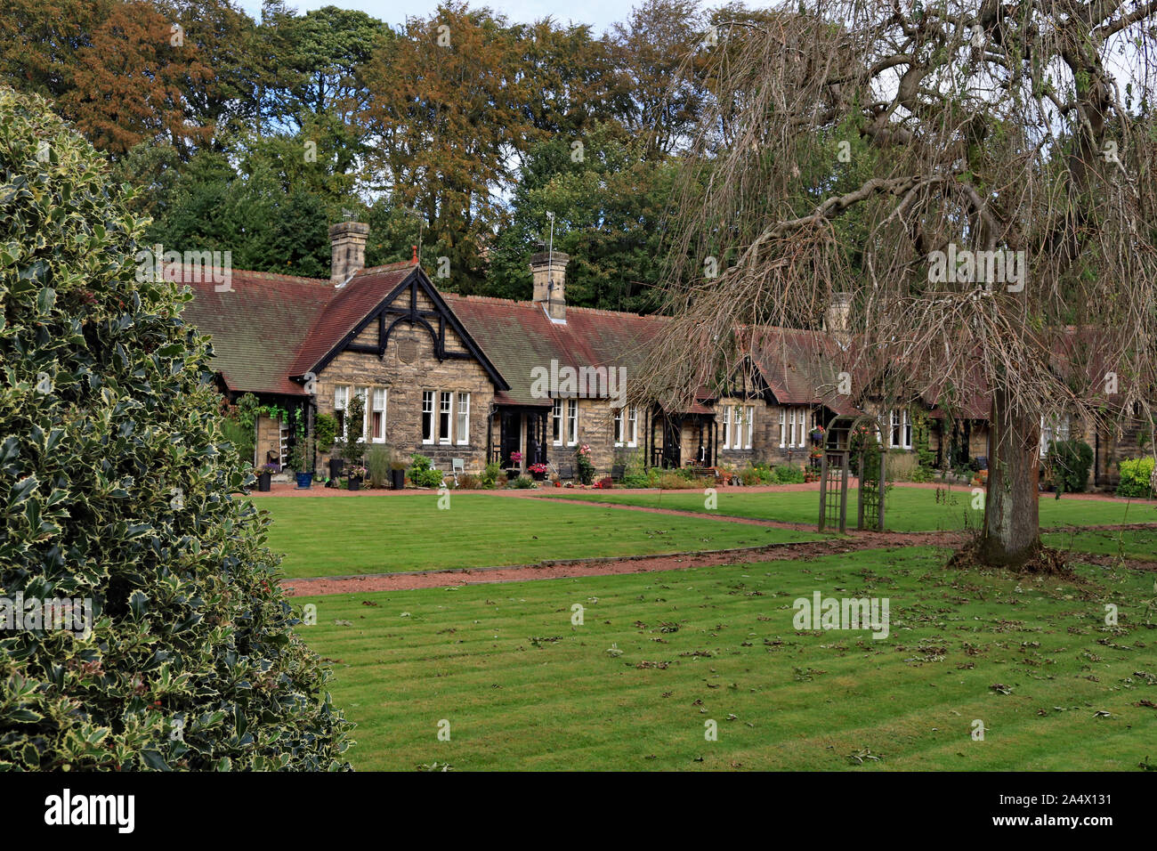 Autumn at the almshouses in Rothbury, in 1896 William Baron