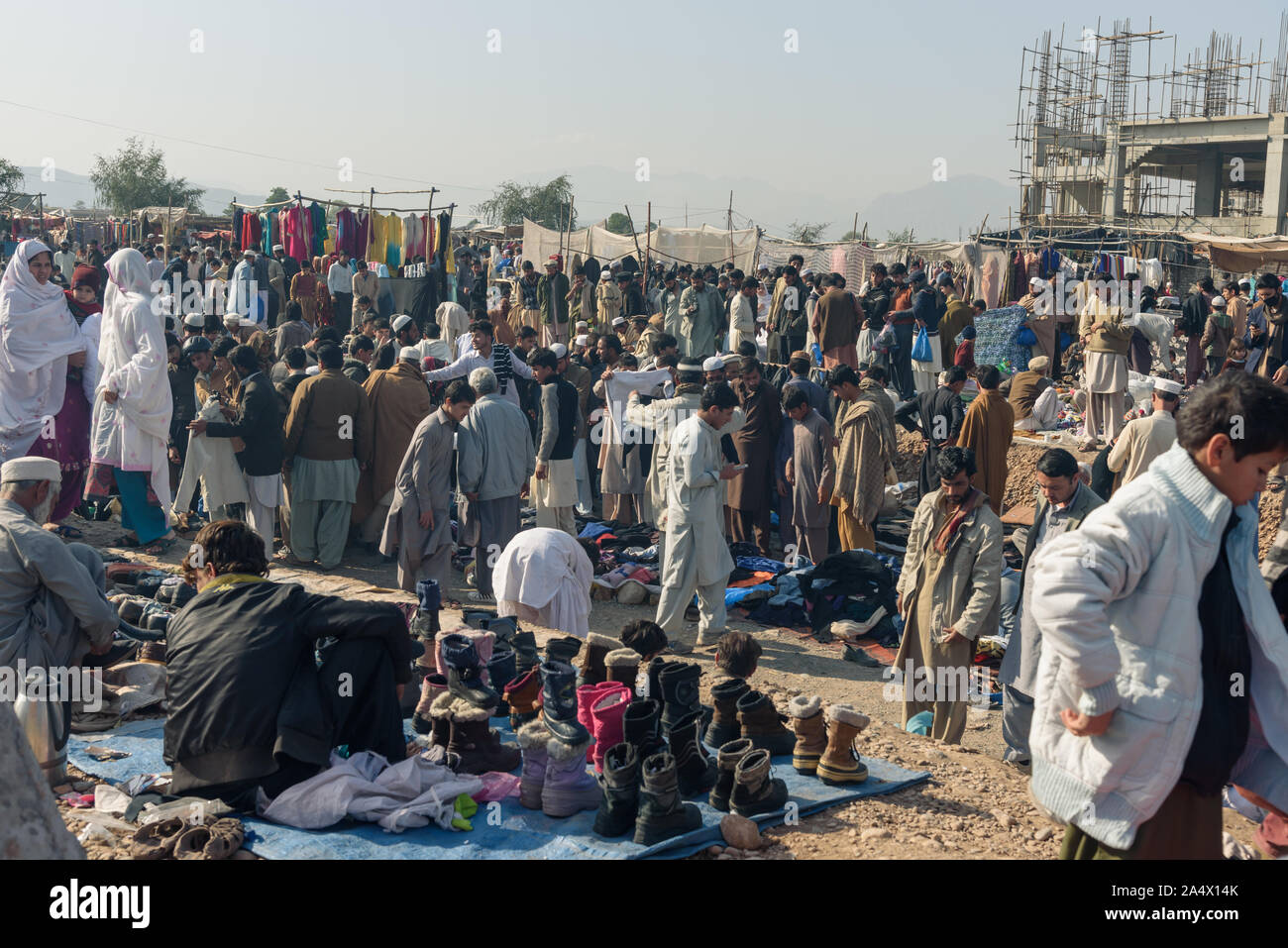 PESHAWAR, PAKISTAN - DECEMBER 13, 2015: Hustle and bustle at  sunday market of Hayatabad town in Peshawar city Pakistan. Stock Photo
