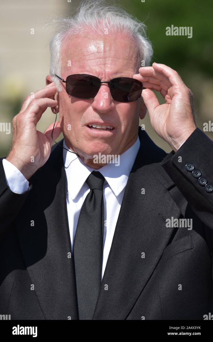 Smiling Handsome Senior Security Guard Stock Photo Alamy