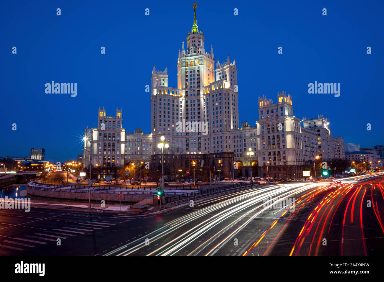 View of the skyscraper on Kotelnicheskaya Embankment and Traffic Trails at Dusk in center of Moscow city, Russia Stock Photo