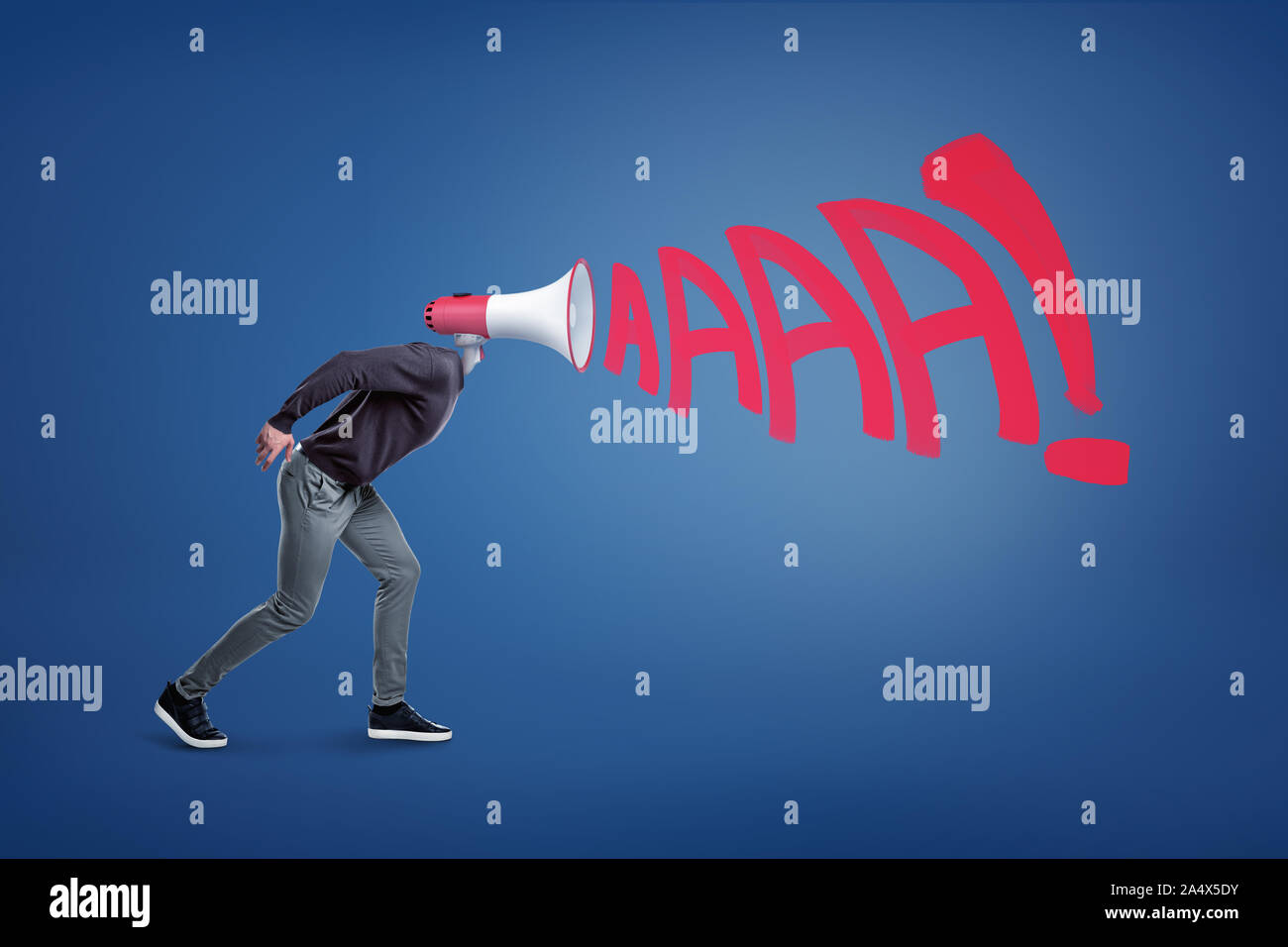 A male figure with a megaphone instead of a head with letters representing a loud scream getting out of it. Stock Photo