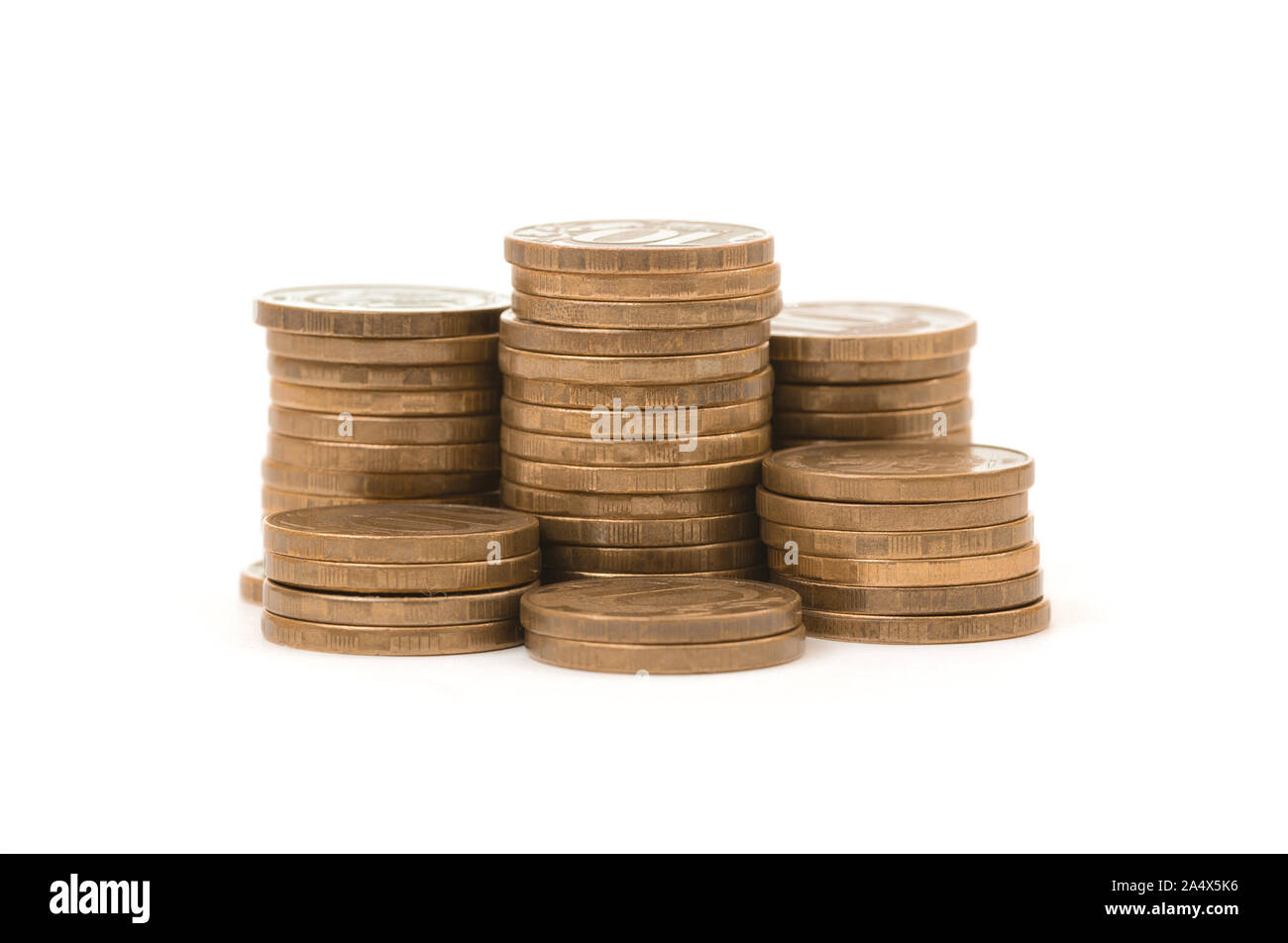 Stacks of golden coins isolated on a white background Stock Photo - Alamy
