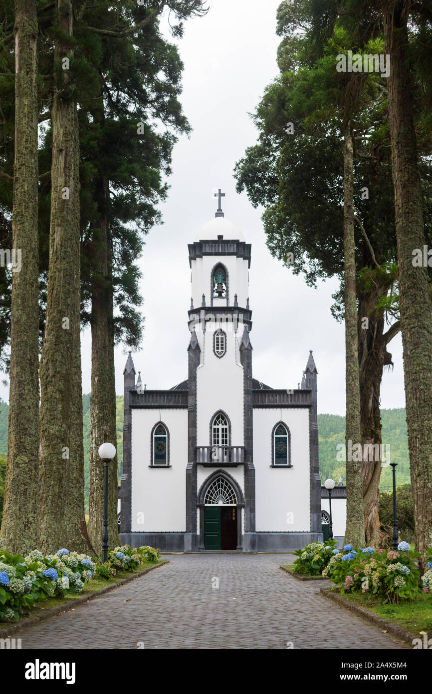 Sete Cidades, São Miguel Island, Azores - September 04 2019: View of the Church of São Nicolau in the town of Sete Cidades. Stock Photo