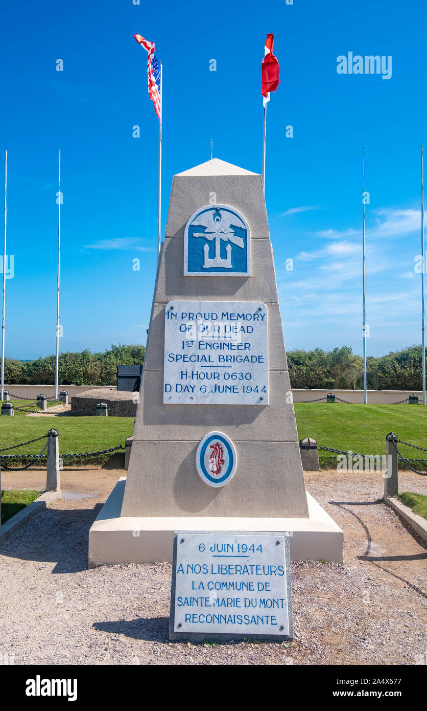 Two flags flank an ito in honor of the soldiers killed at the Normandy landing Stock Photo