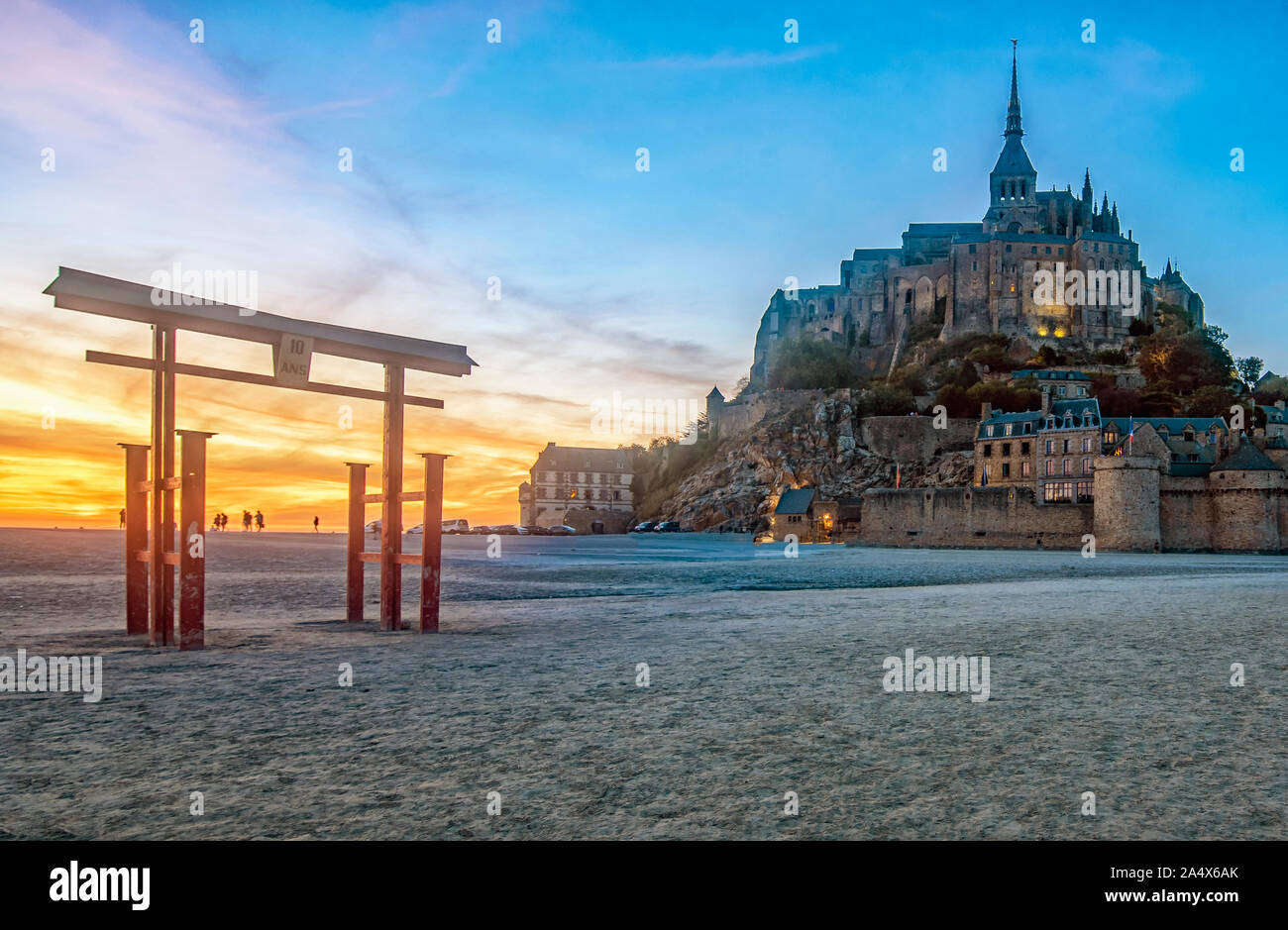 Sunset on Mount Saint Michel with a Japanese temple Stock Photo