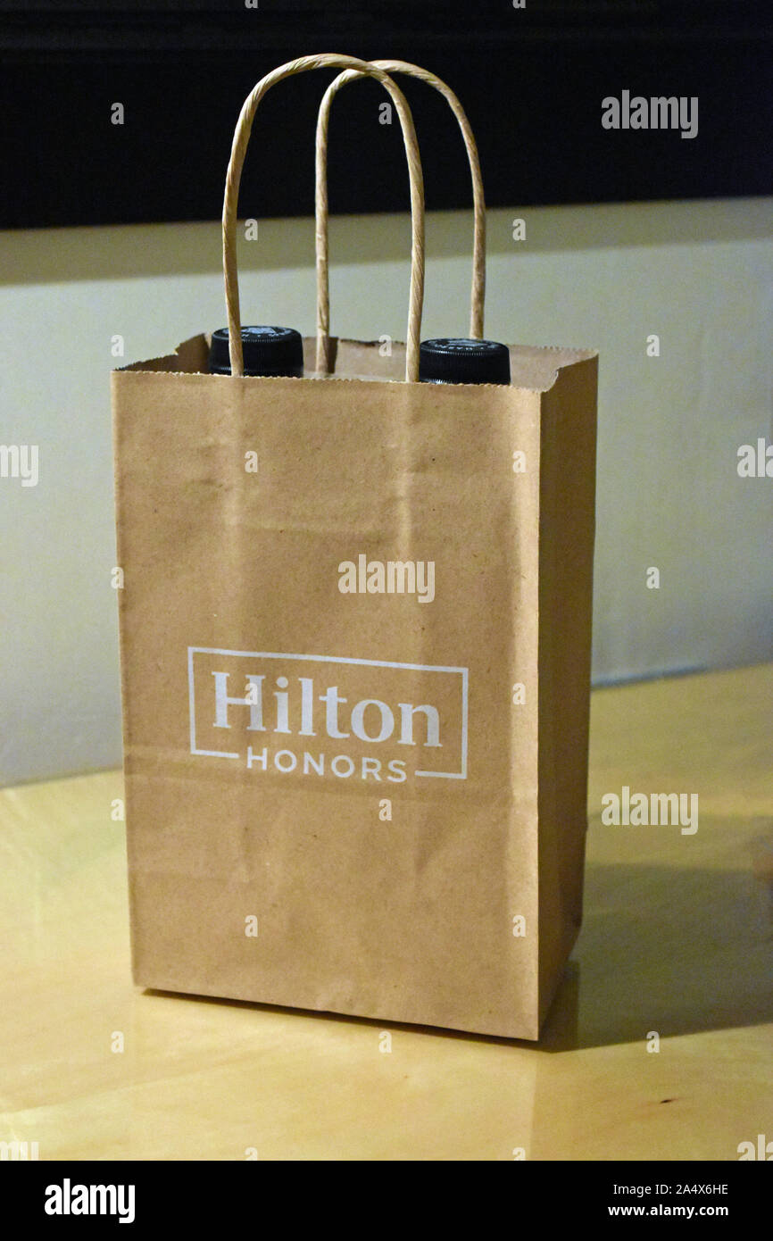 Download Hilton Honors Paper Bag With 2 Bottles Of Still Water Stock Photo Alamy