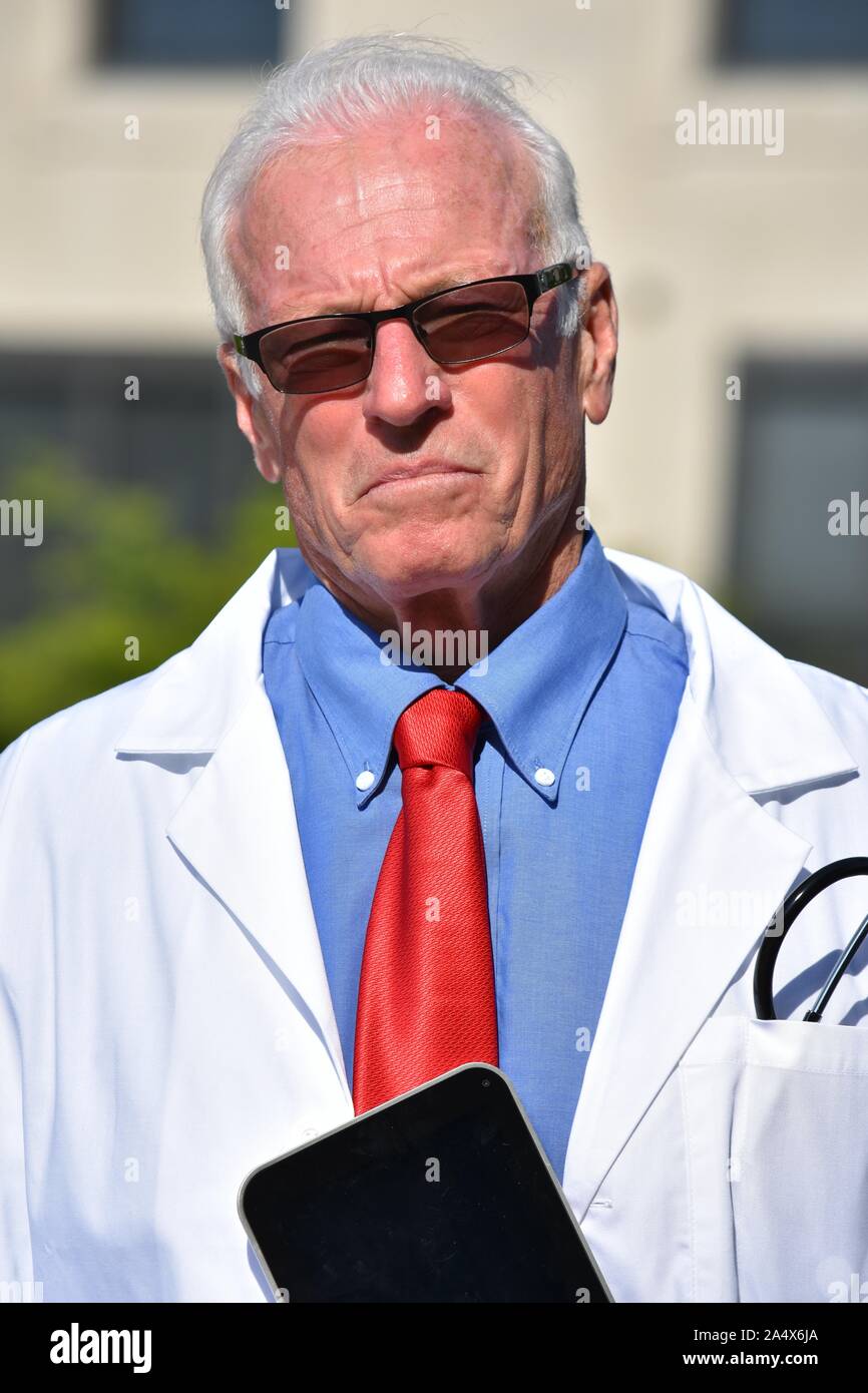 Serious Male Doctor Wearing Lab Coat At Hospital Stock Photo Alamy