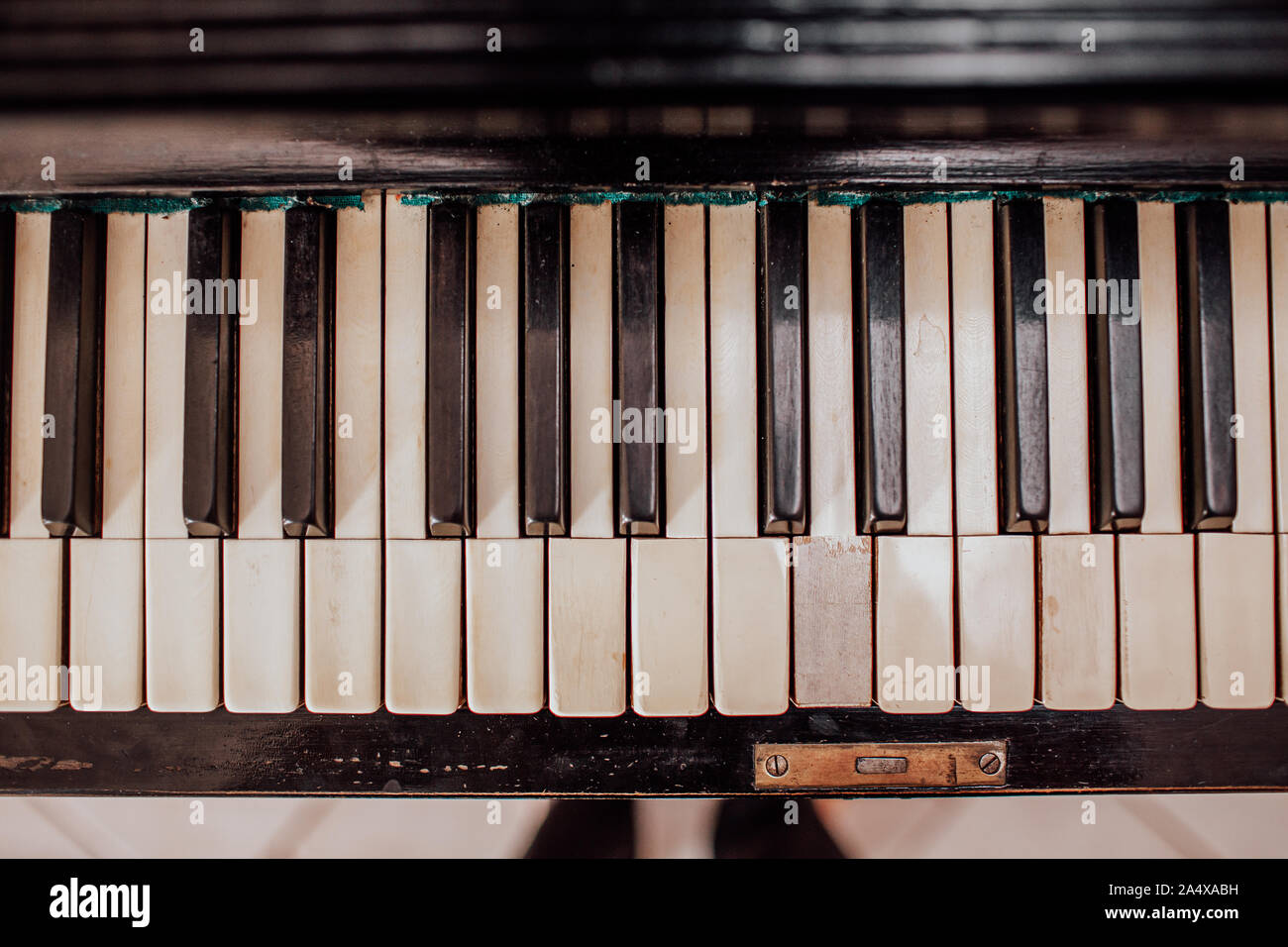 Old Piano yellow keys viewed from above Stock Photo Alamy