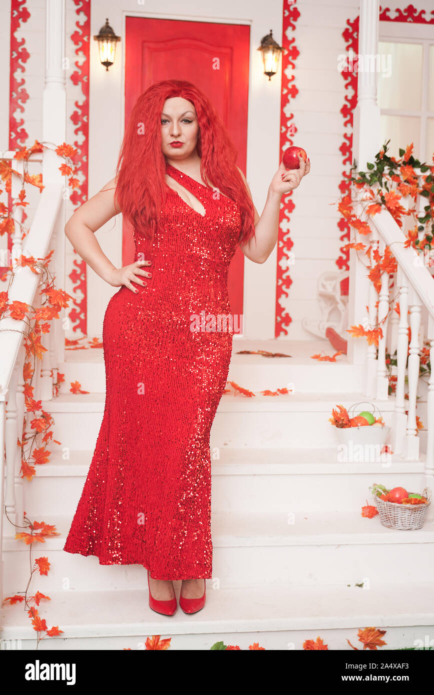 Beautiful Autumn Chic Girl Posing With Red Apple On The Porch Of White House Gorgeous Plus Size Woman With A Curvaceous Figure In A Long Tight Full L Stock Photo Alamy