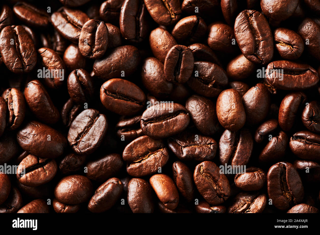 Roasted coffee beans background. For design and texture Close up Stock ...