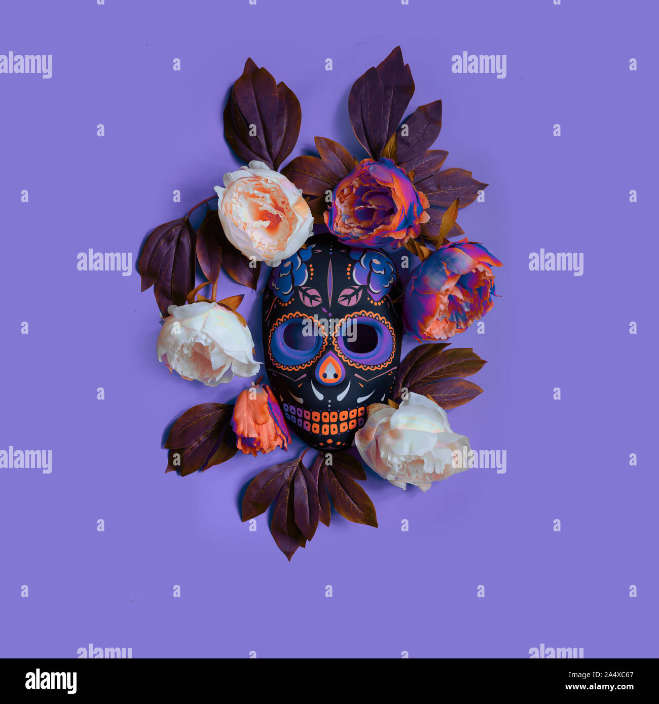 Sugar skull mask with flowers used for celebrating Day of the Dead in ...