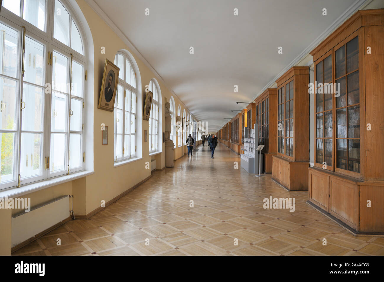 People in the Twelve Colleges building, now the academic building of St. Petersburg University, St. Petersburg, Russia Stock Photo