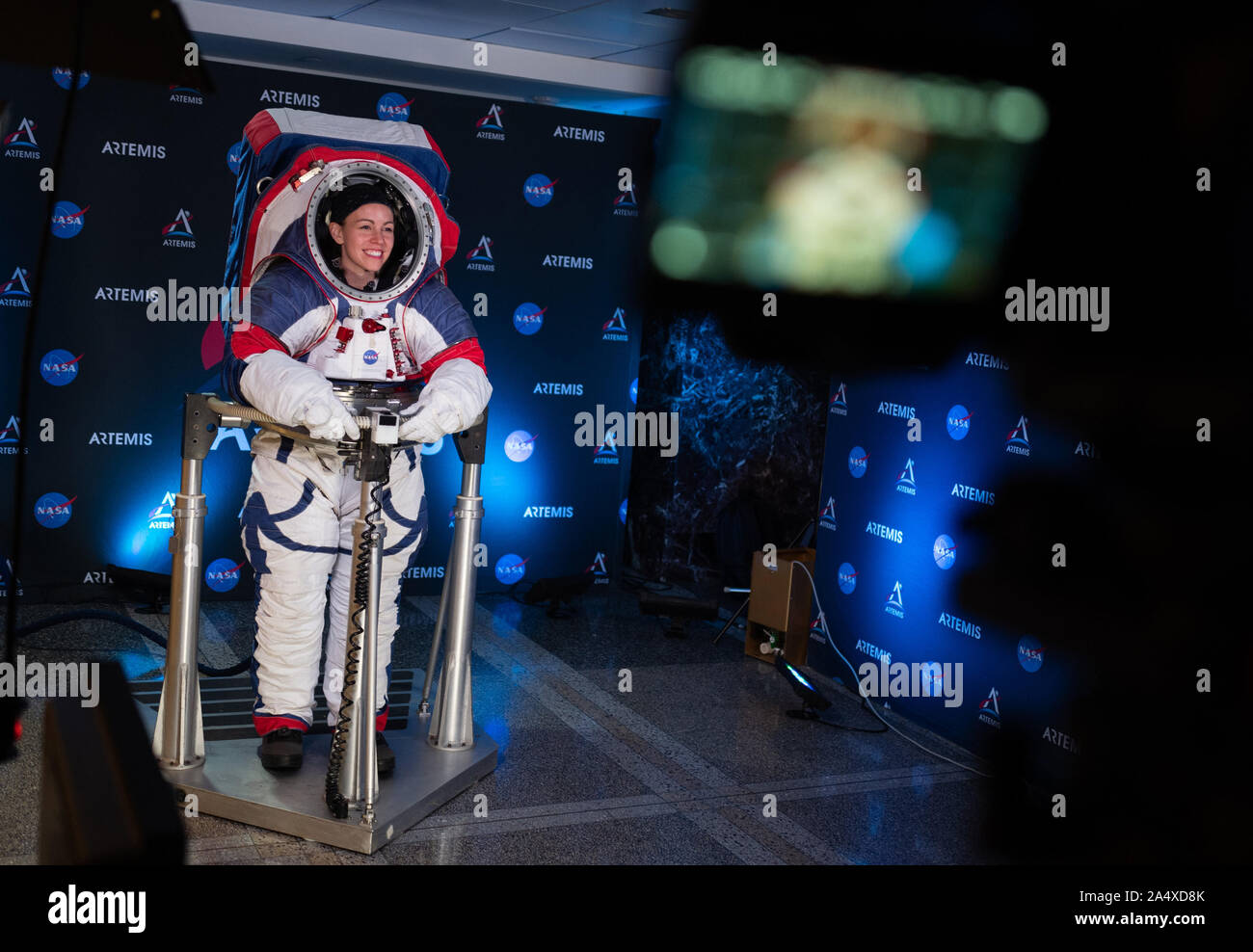Kristine Davis, a spacesuit engineer at NASA's Johnson Space Center, wearing a ground prototype of NASA's new Exploration Extravehicular Mobility Unit (xEMU), is seen during a demonstration of the suit, on October 15, 2019, at NASA Headquarters in Washington. The xEMU suit improves on the suits previous worn on the Moon during the Apollo era and those currently in use for spacewalks outside the International Space Station and will be worn by first woman and next man as they explore the Moon as part of the agency's Artemis program. NASA Photo by Joel Kowsky/UPI Stock Photo