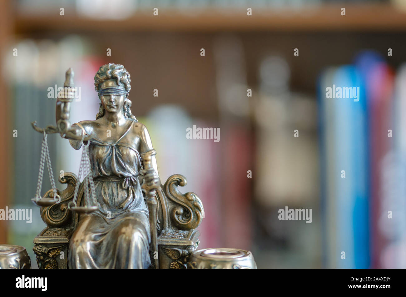 Statue of justice in front of library, law concept. Stock Photo