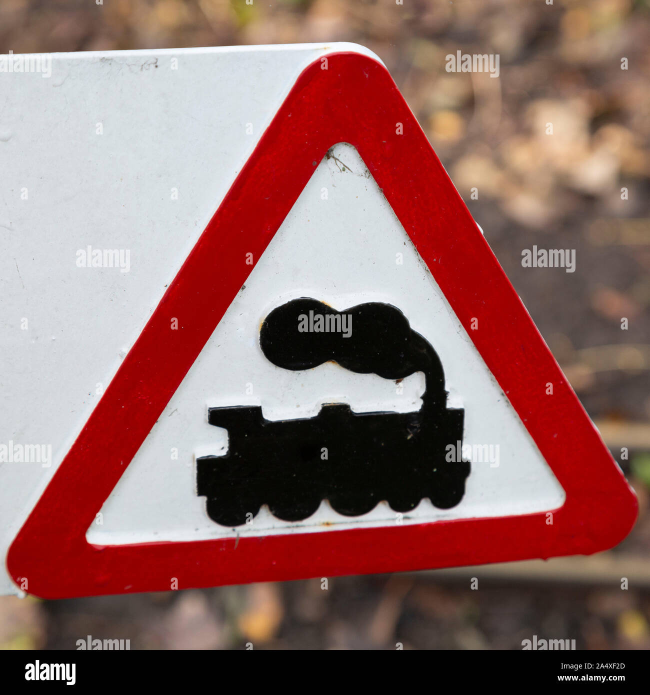 Sign warning of the Lakeshore Railroad in South Shields, England. The railway circumnavigates the boating lake in Souh Marine Park. Stock Photo