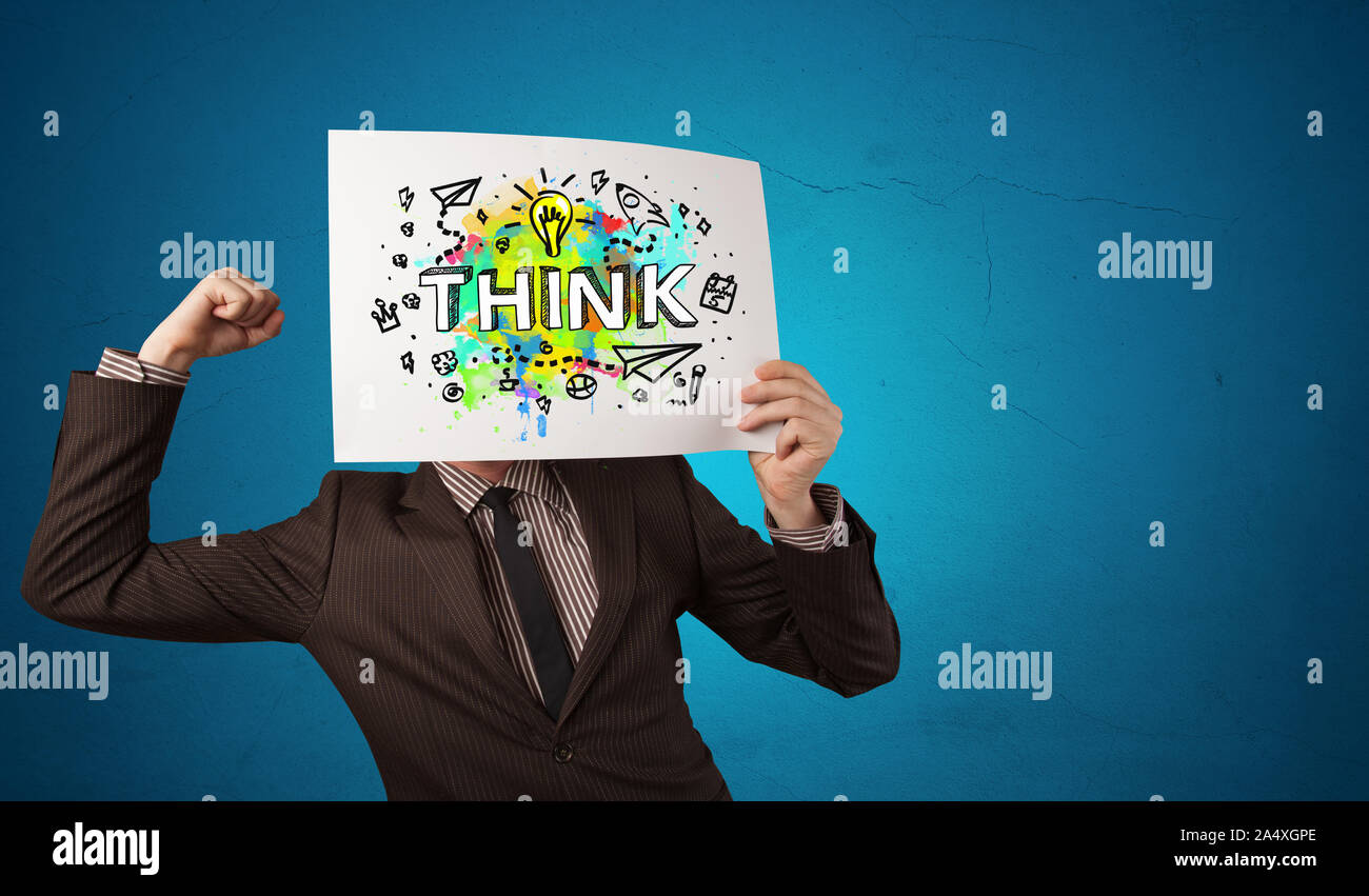 Young person holding paper with design thinking concept Stock Photo - Alamy